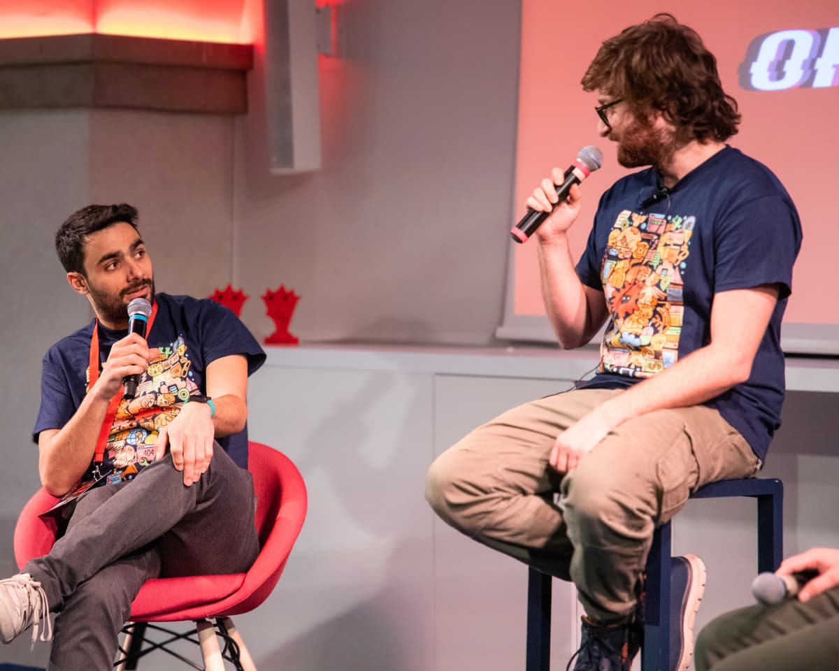 Schrödinger Hat community members on stage