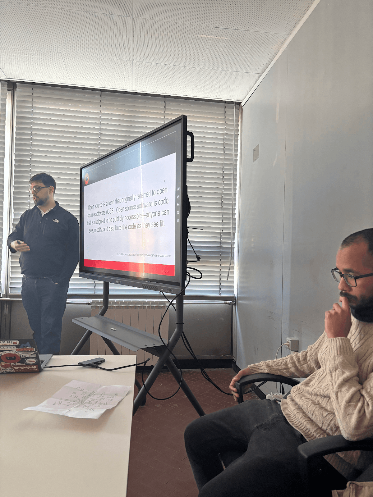 Schrödinger Hat members giving a lesson to high schoolers